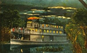 Old postcard of steamboat on Florida river at night.