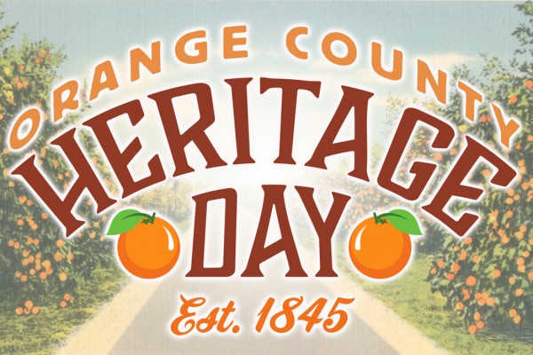 Arched type reads Orange County Heritage Day with citrus grove in the background