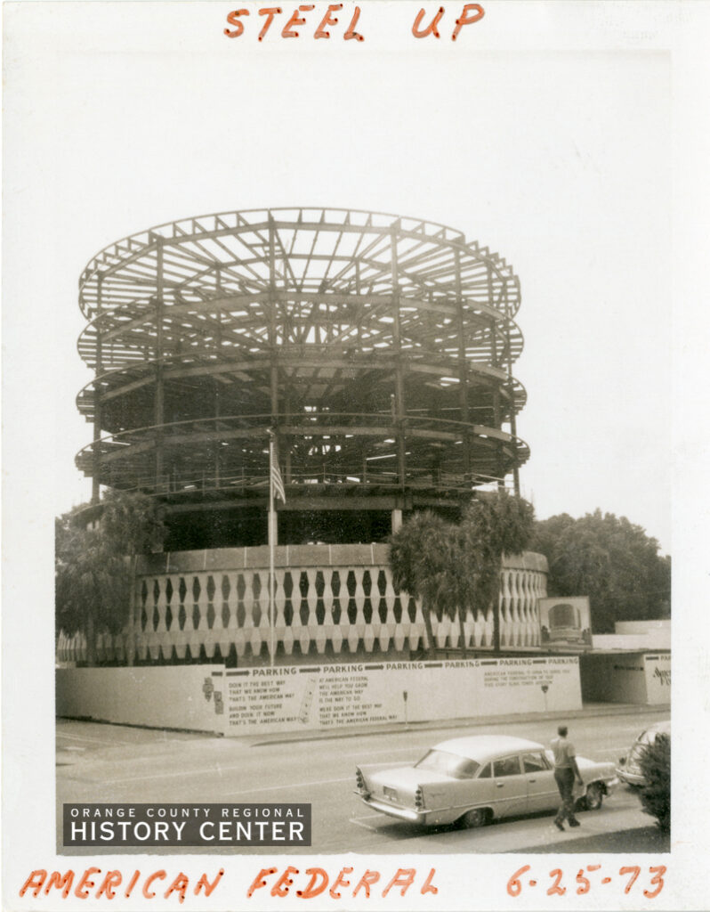 Back and white construction photo of additional floors being added to American Federal taken 6-25-73 shows girders for new floors above original building.